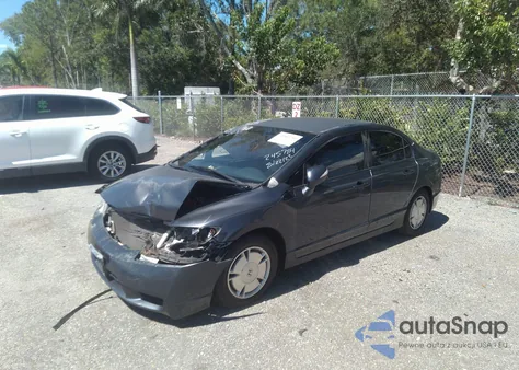 2009 Honda Civic Hybrid from USA, damaged, VIN JHMFA362X9S013436